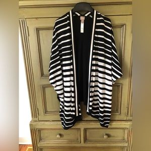 Woman’s Chico’s black and white sweater.